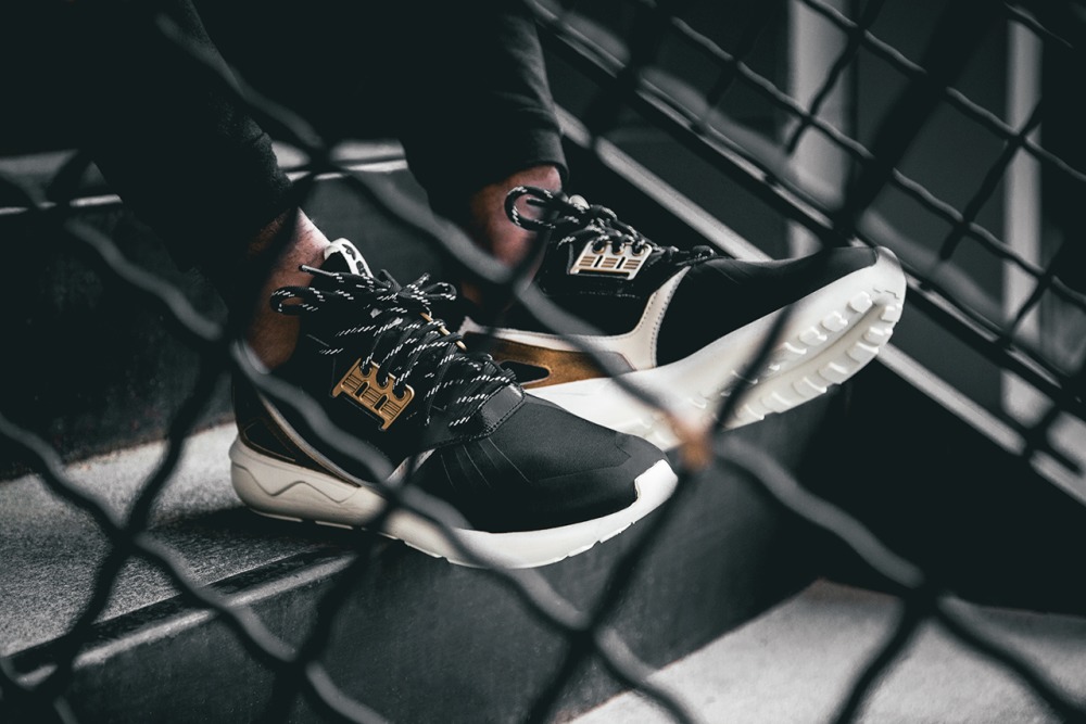 Black and best sale gold adidas tubular