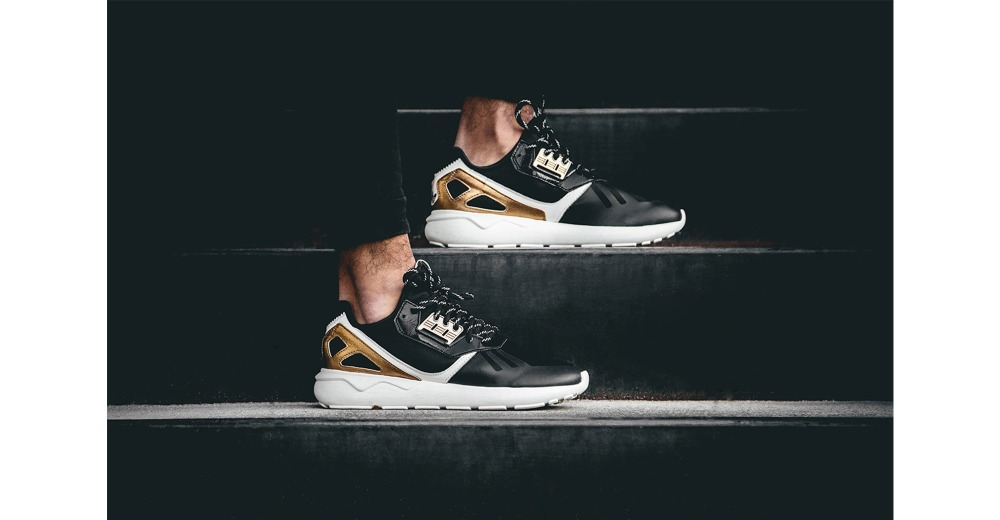 Adidas tubular black gold best sale