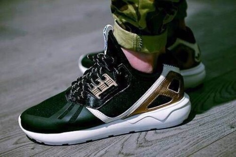 Adidas tubular runner shop black and gold